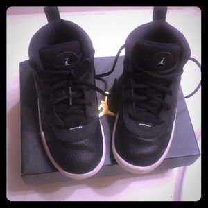 Toddlers black and white jump man Jordan’s
